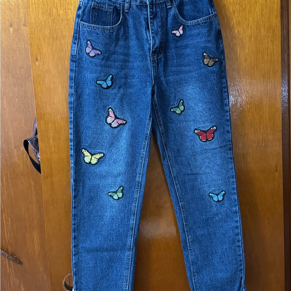 SHEIN Blue Jeans with Butterfly Accents